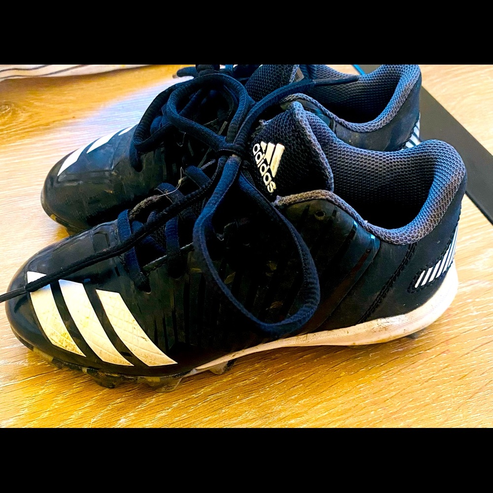size 13 cleats, used half season. little kid size